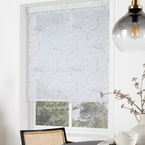 https://onlineblindz.co.uk/hub/blinds/roller-blind/cherry-blossom-misty-blue-roller-blind-4.webp