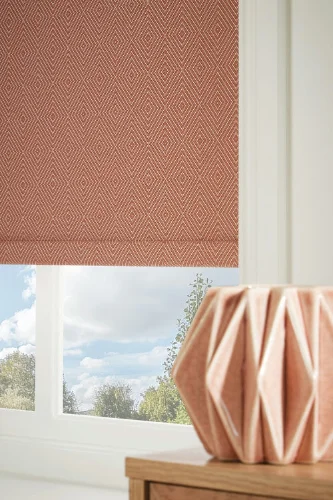 https://onlineblindz.co.uk/hub/blinds/roller-blind/dunham-terracotta-blackout-roller-blind-2.webp