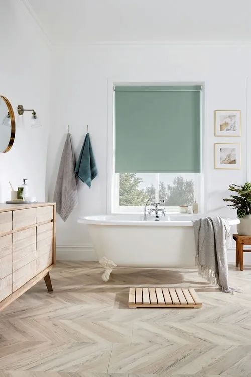 https://onlineblindz.co.uk/hub/blinds/roller-blind/ex-lite-green-blackout-roller-blind-2.webp